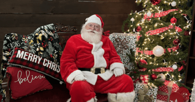 Santa sitting on a bench